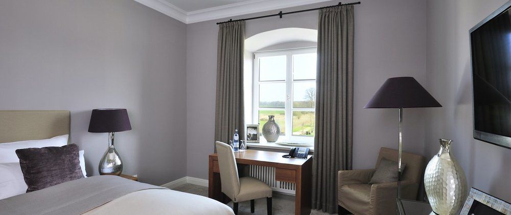 Schlossgut Gross Schwansee Exterior photo Curtains in a bedroom